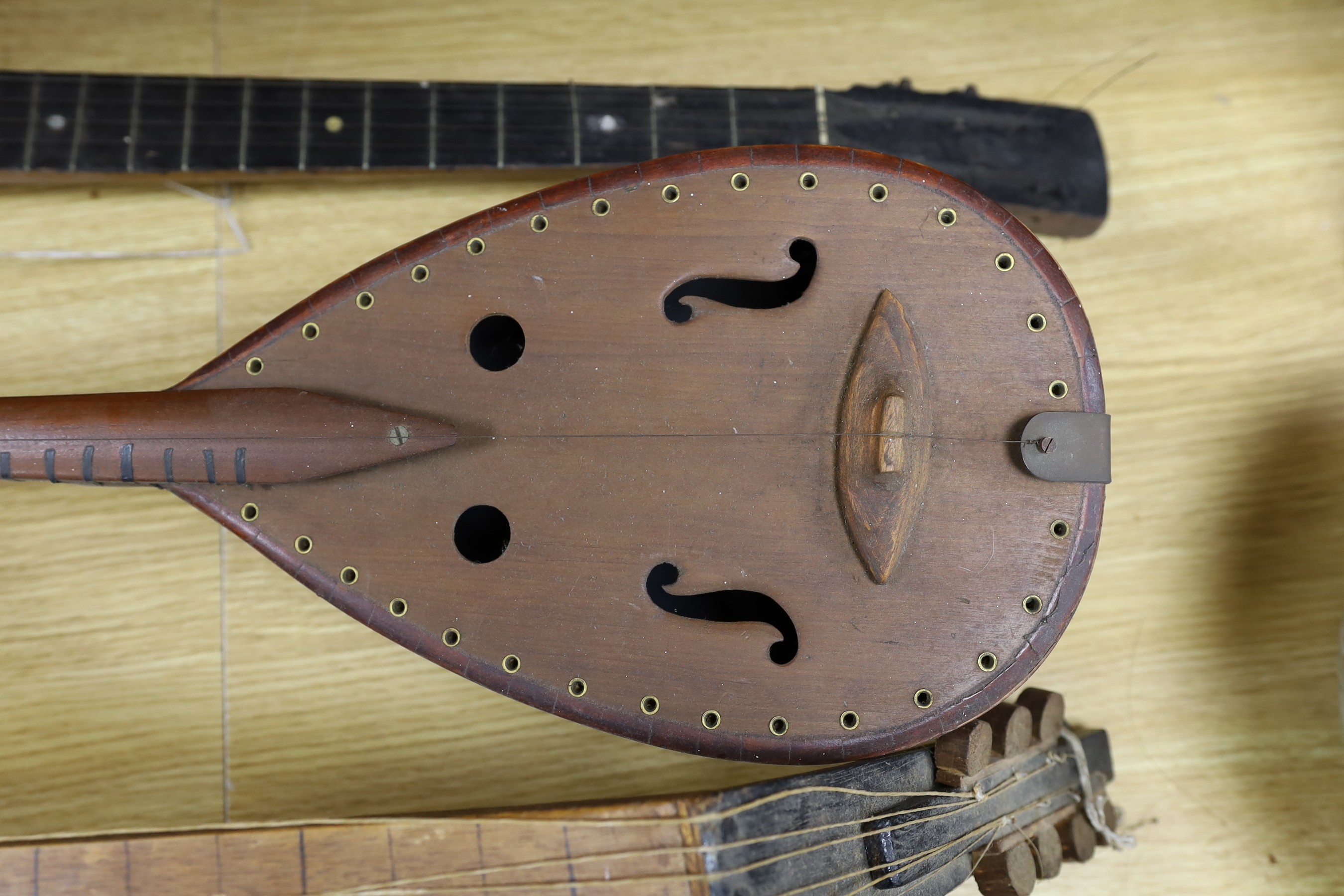 Three various stringed instruments - attention needed